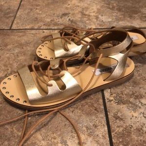 Gold tie up gladiator sandals